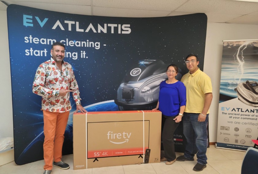 A Blue Planet Distribution rep picking up his prize at the office after a sales contest